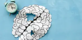 brain made of paper damaged by old age age related changes and mental health signs of dementia and head disease