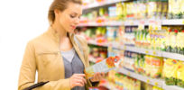FDA Reading Food Label Woman Grocery Store Nutrition Label Changes