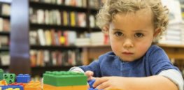 autistic child playing e