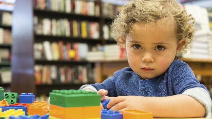 autistic child playing e