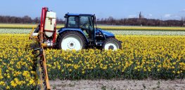 New Holland TL and field sprayer
