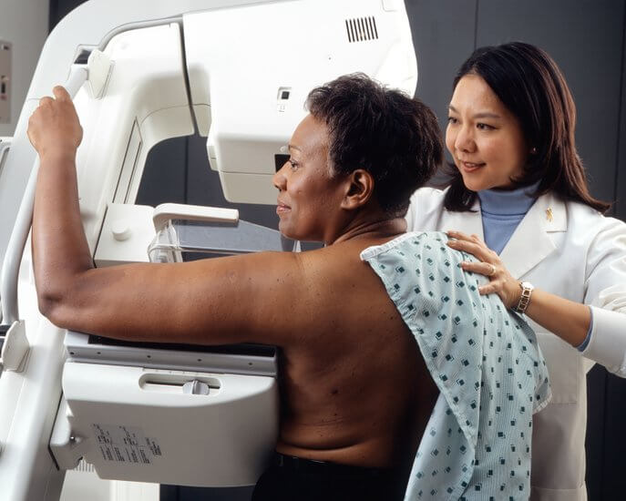 Woman receives mammogram t x