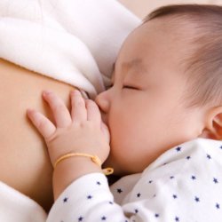 a mother breastfeeding her baby