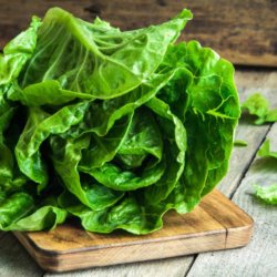 romaine lettuce on wooden chopping board