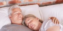 senior man sleeping with wife hero