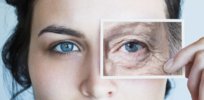 young woman with photo of aged eye over her high res stock photography