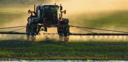 farmer spraying crops can be used for dicamba articles