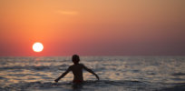 beach boy child dawn dusk horizon kid leisure