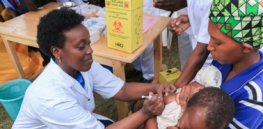 the minister of health dr diane gashumba providing measles and rubella vaccine