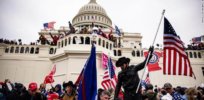 After the failed Capitol riot, far right militias regroup around anti-vaccine conspiracy theories