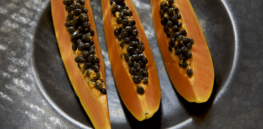 What role can gene editing play in neutralizing the global devastation caused by papaya viruses?