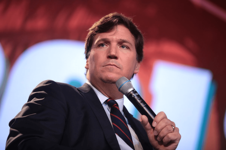 Tucker Carlson’s Controversial Comments on Evolution Spark Debate on The Joe Rogan Experience Podcast
