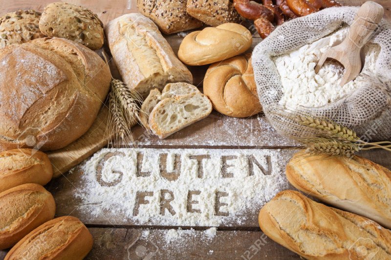 a gluten free breads on wood background Stock Photo bread gluten food