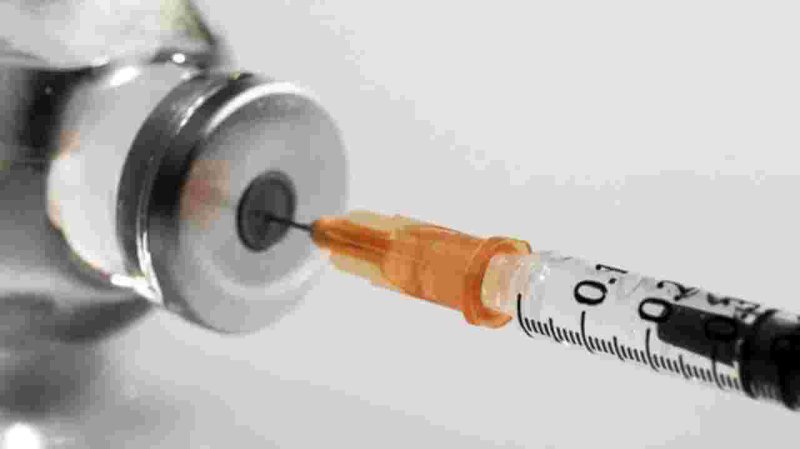 vial and syringe flu shot large