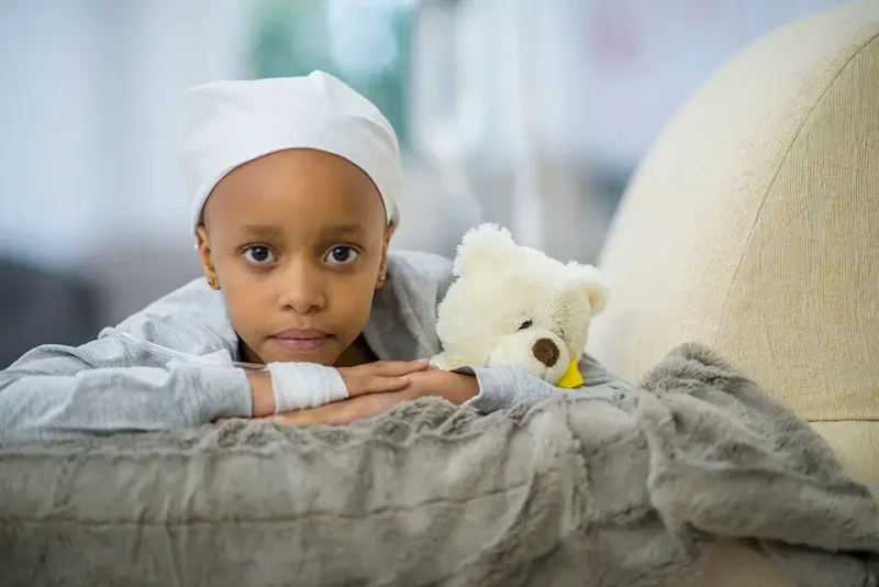 black-child-head-wrap-white-teddy-bear-restricted