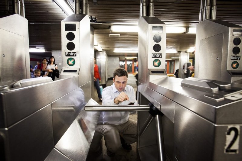 Researcher Christopher Mason from Weill Cornell Medical College collecting DNA samples at the 68th Street subway station in New York City. Credit: Katie Orlinsky/Wall Street Journal