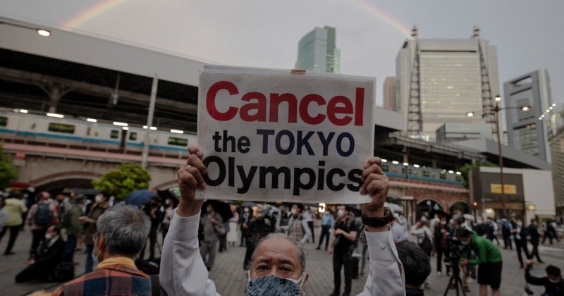 People take part in a protest against the hosting of the 2020 Tokyo Olympic Games in Tokyo on May 17, 2021. Credit: LA Times
