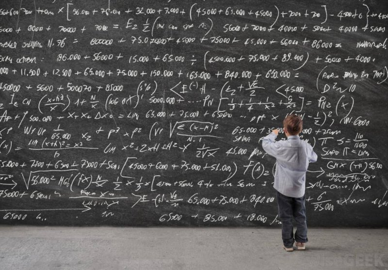 child at math blackboard