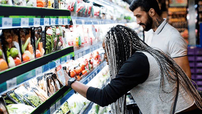 couple shopping grocery store
