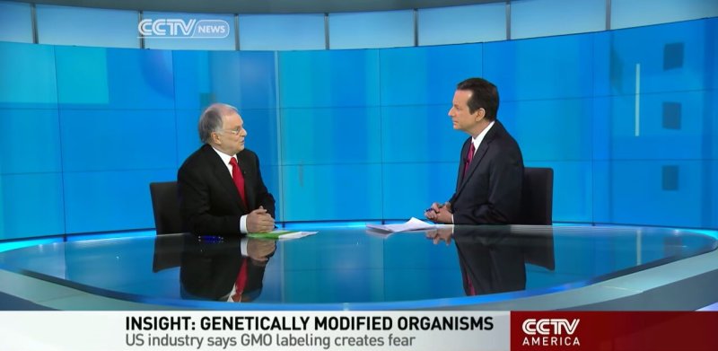 News anchor Mike Walter and CEO David Green discuss GMO regulation. Credit: Youtube