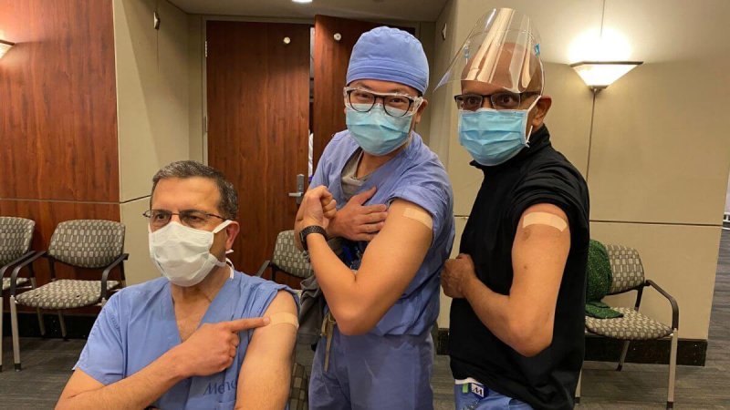 Drs. Faisal Masud, Steven Hsu, and Dharamvir Jain pose after receiving vaccinations at Houston Methodist Hospital. Credit: Greg Abbott