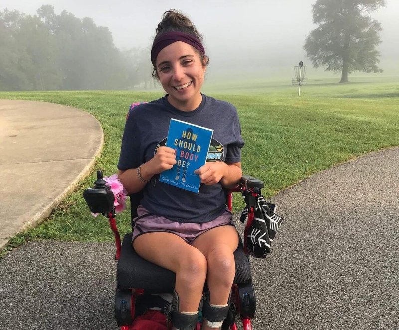 Bethany Meloche with her book, How Should a Body Be? Credit: Bethany Meloche