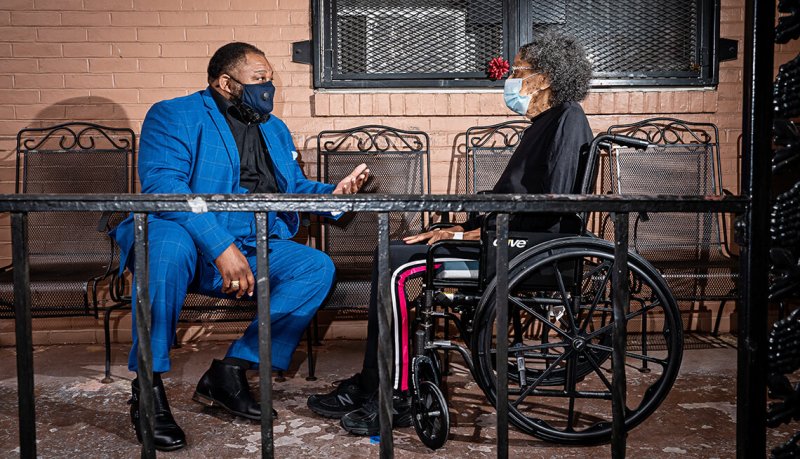 Rev Doc Derrick DeWitt at the Maryland Baptist Aged Home with his aunt, Gerri Alston. Thanks to his efforts, the home has had zero COVID cases or deaths among staff and residents. Credit: Scott Suchman