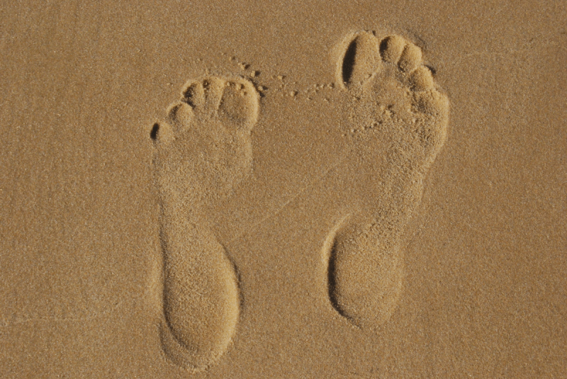 sand footprint tracks in the sand footprints beach barefoot brown sand