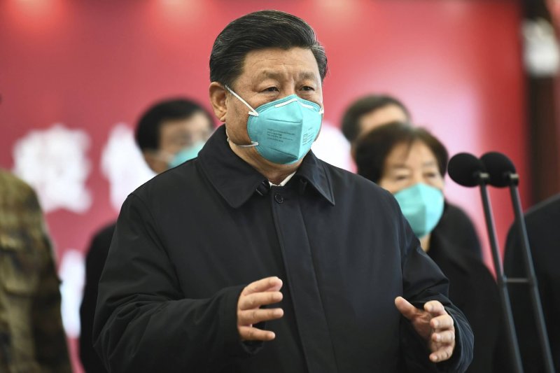 Chinese President Xi Jinping talks by video with patients and medical workers at the Huoshenshan Hospital in Wuhan in central China's Hubei Province. Credit: Xie Huanchi/Xinhua/AP