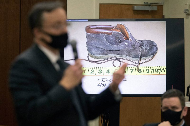 Snohomish County deputy prosecutor Craig Matheson talks about DNA found on a shoe, worn by victim Jody Loomis. Credit: Andy Bronson/The Herald