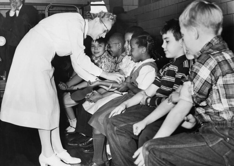 A nurse prepared children for a polio vaccination in Pittsburgh in 1954. Credit: Bettmann/Getty Images